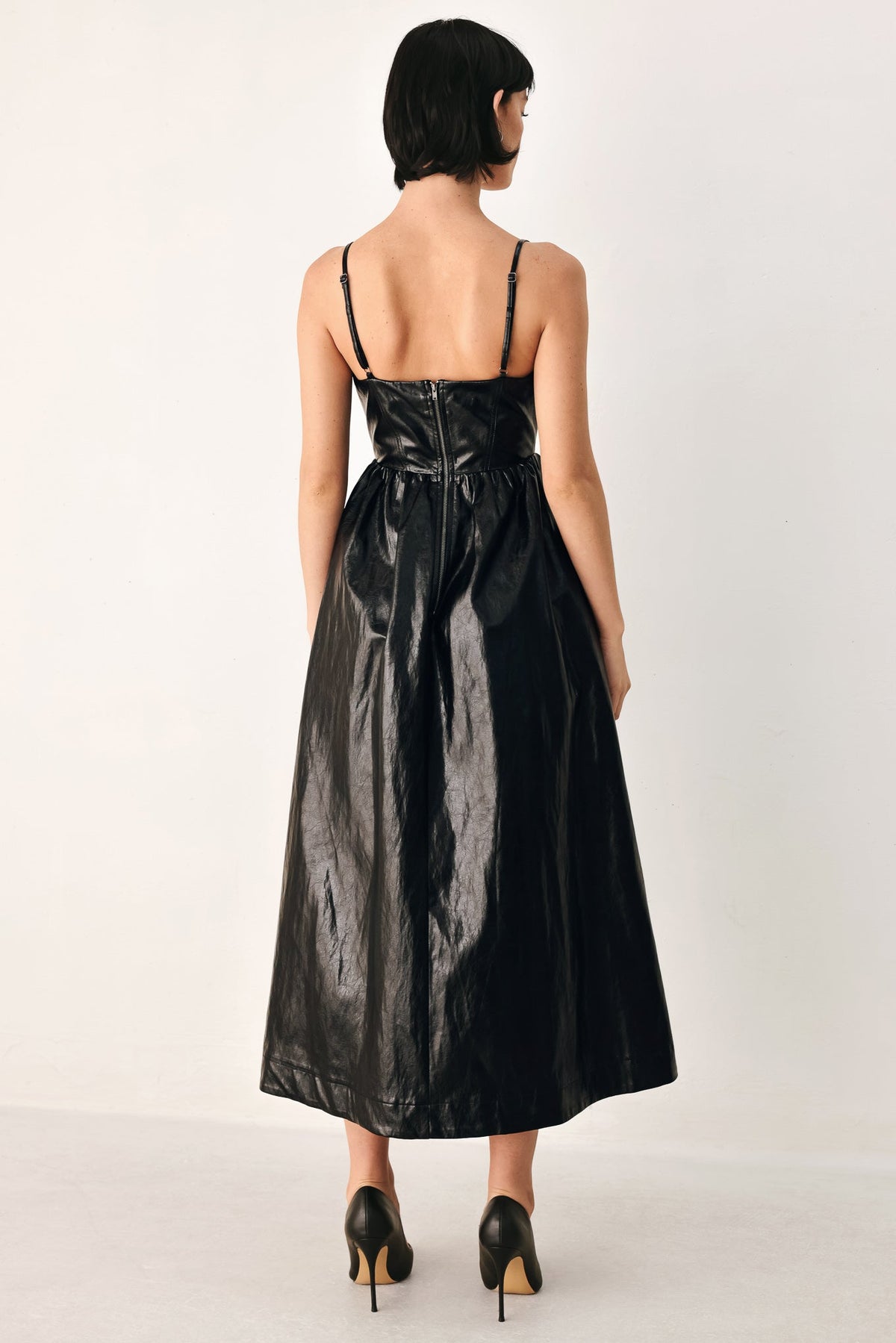 DRESSED TO THRILL FAUX LEATHER MIDI DRESS - Prim Clothing Company